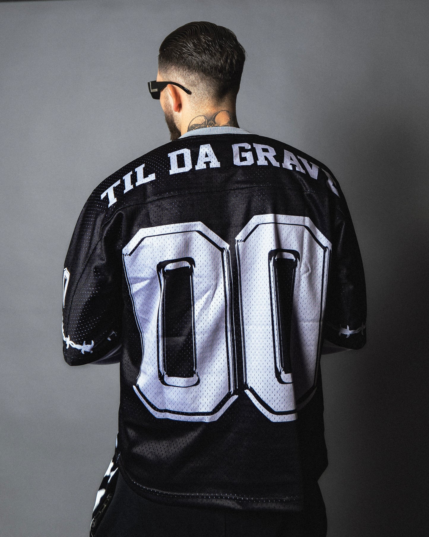 “Obituary” American football jersey