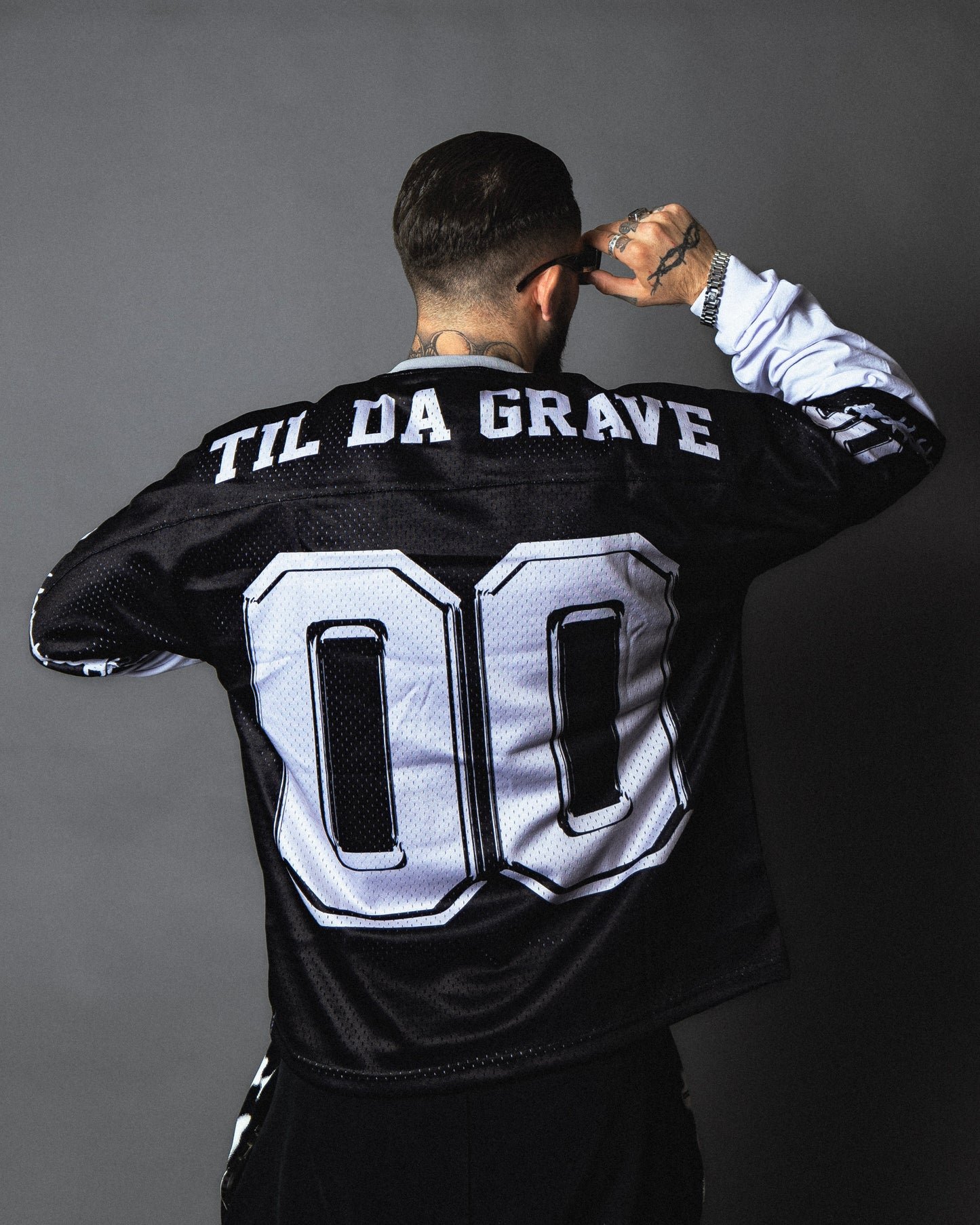 “Obituary” American football jersey